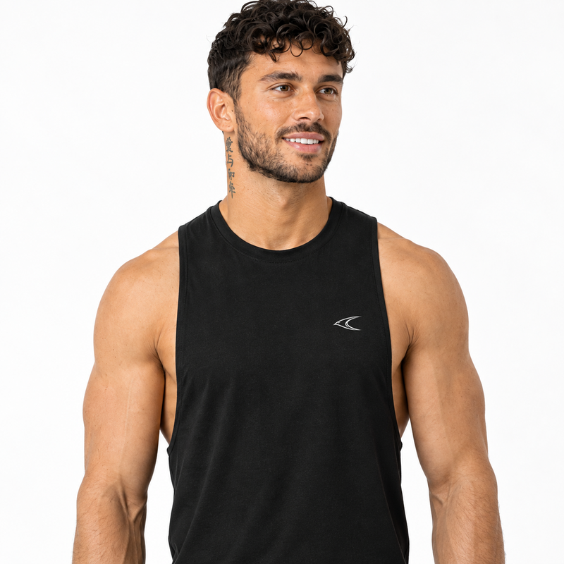 Model wearing the black Swift sleeveless gym vest, white chest logo
